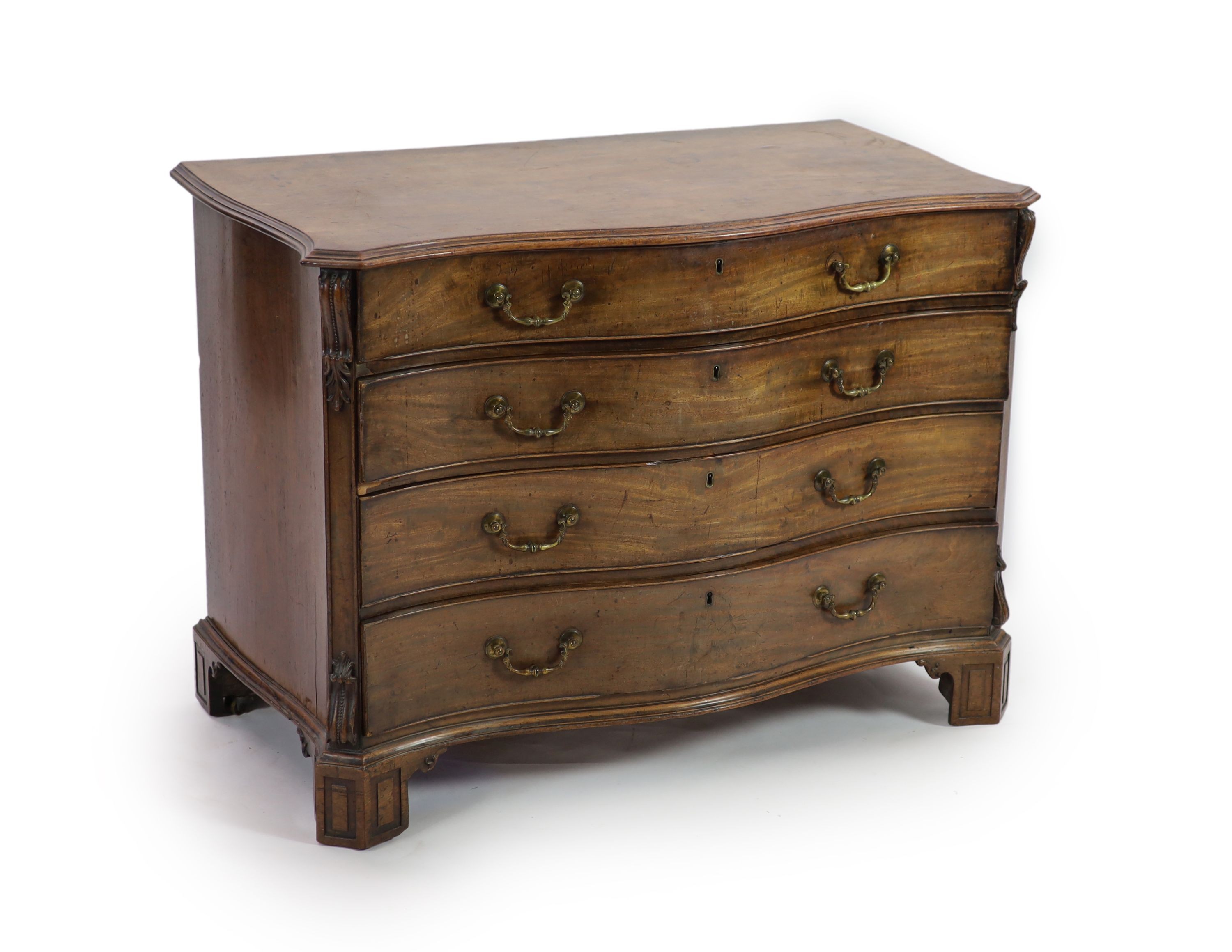 A George III Chippendale style mahogany serpentine commode W 112cm D 62cm H 83cm